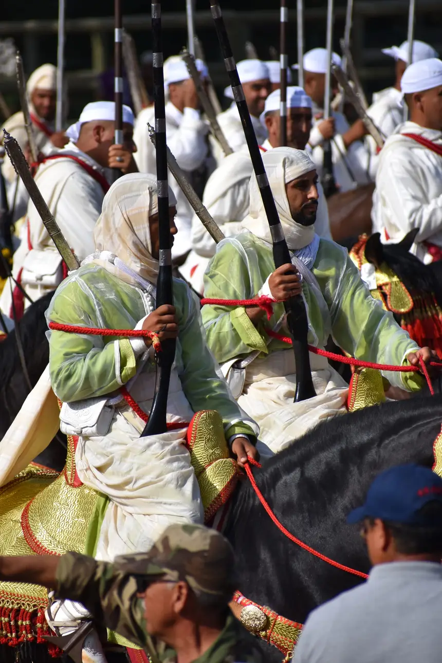 Tbourida fantasia print — Moroccan horsemen charging through gunpowder smoke (BWK-633), photograph by Saida