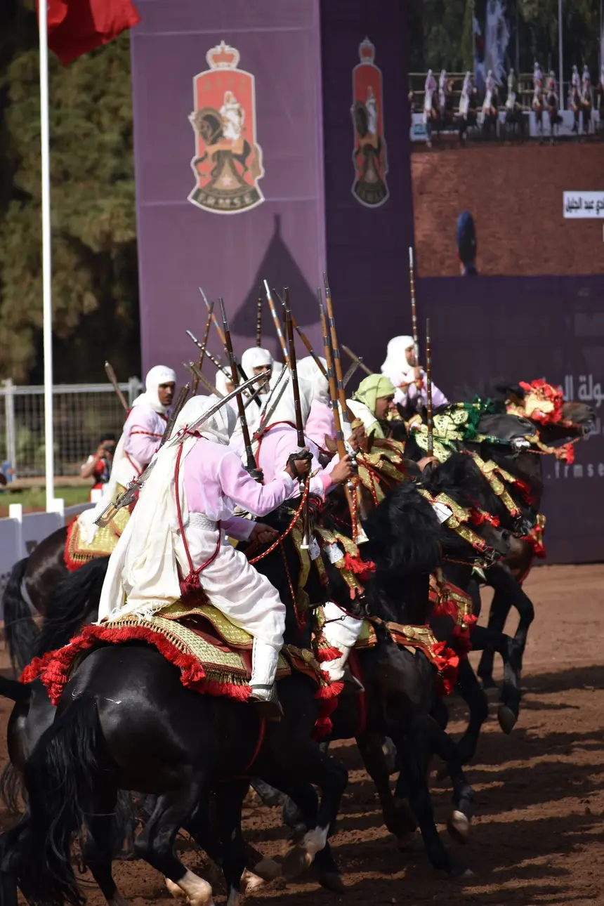 Tbourida fantasia print — Moroccan horsemen charging through gunpowder smoke (BWK-657), photograph by Saida