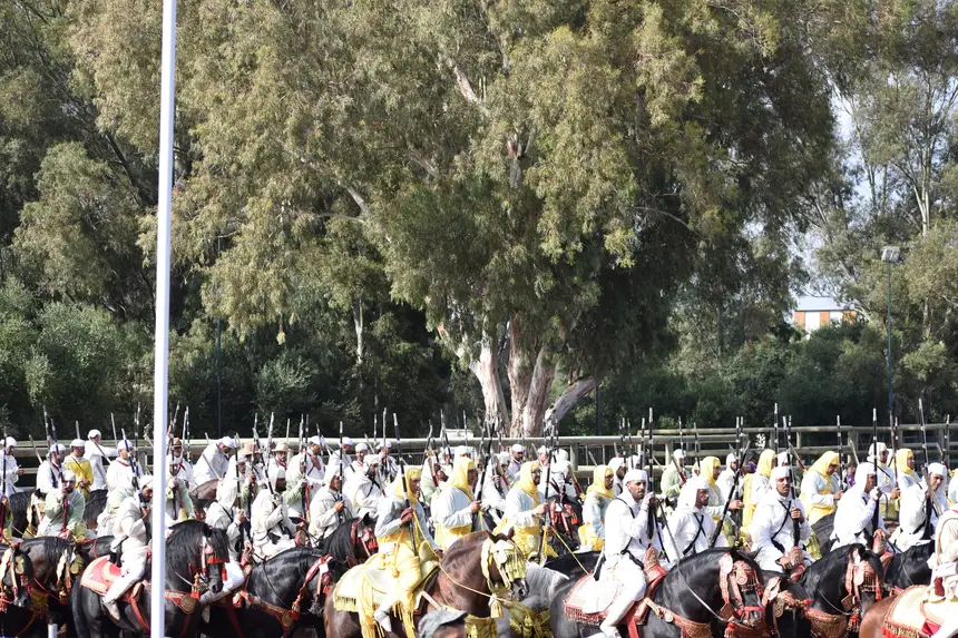 Tbourida fantasia print — Moroccan horsemen charging through gunpowder smoke (BWK-662), photograph by Saida