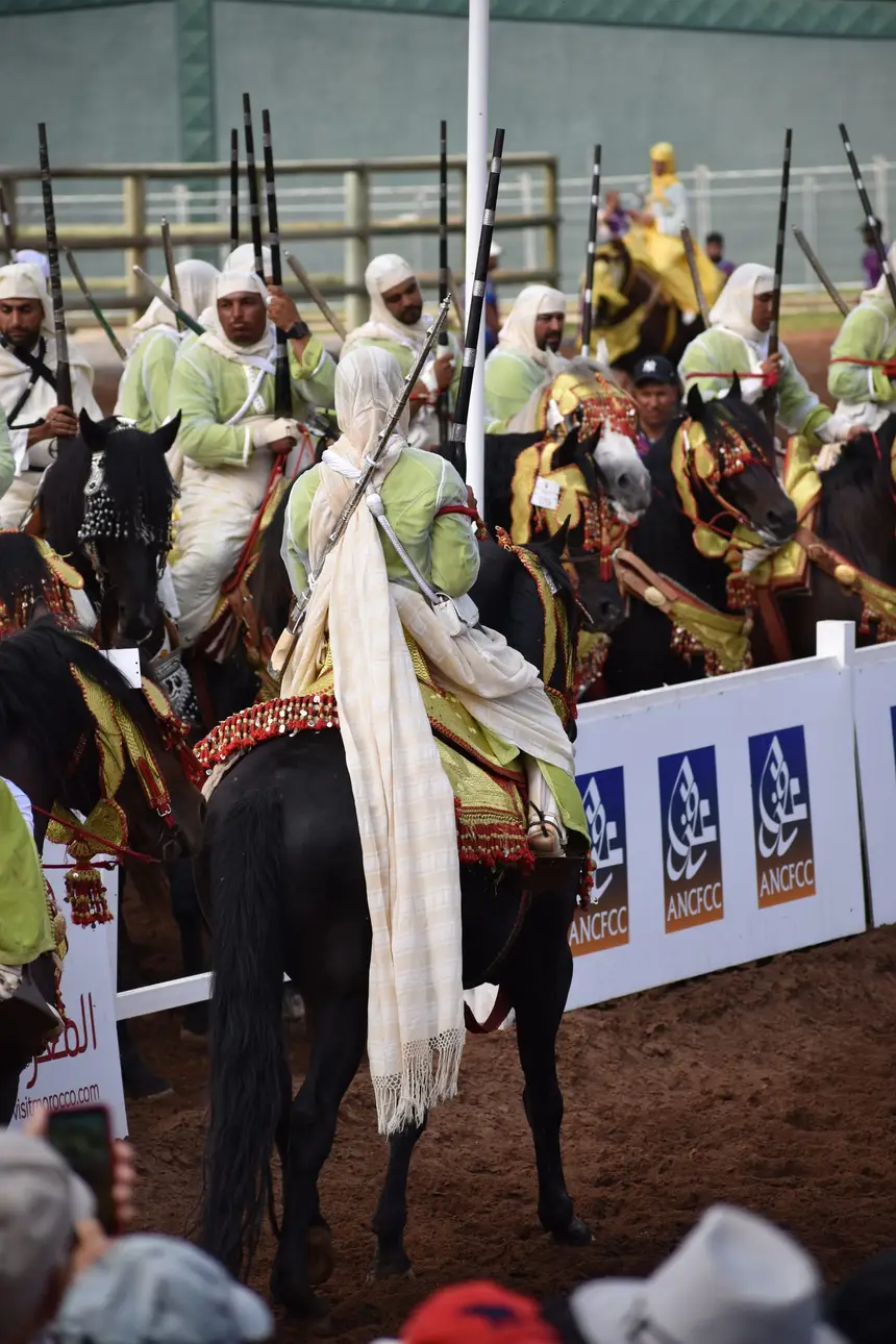 Tbourida fantasia print — Moroccan horsemen charging through gunpowder smoke (BWK-678), photograph by Saida