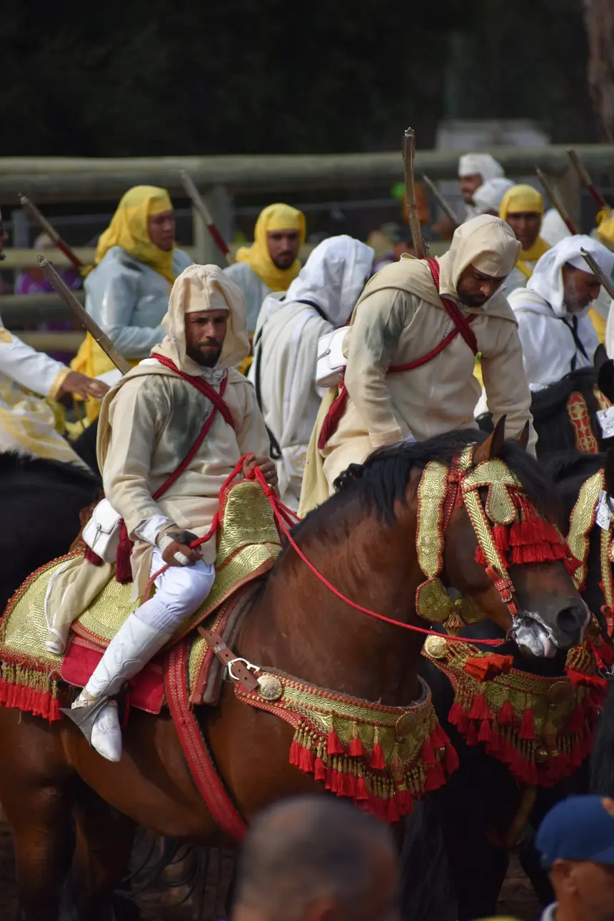 Tbourida fantasia print — Moroccan horsemen charging through gunpowder smoke (BWK-686), photograph by Saida