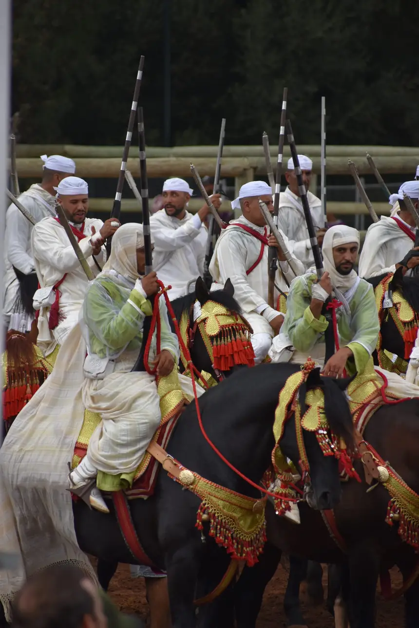 Tbourida fantasia print — Moroccan horsemen charging through gunpowder smoke (BWK-701), photograph by Saida