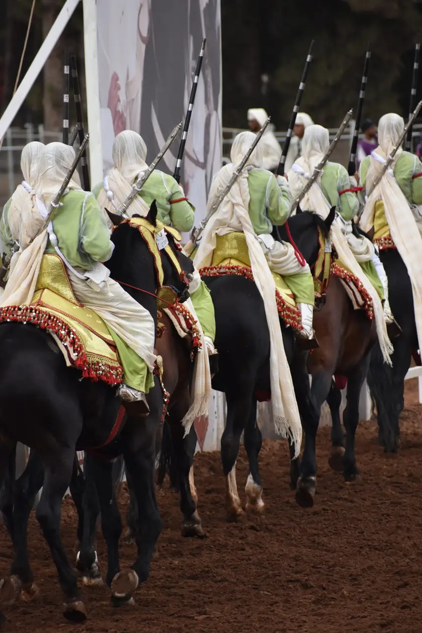 Tbourida fantasia print — Moroccan horsemen charging through gunpowder smoke (BWK-708), photograph by Saida