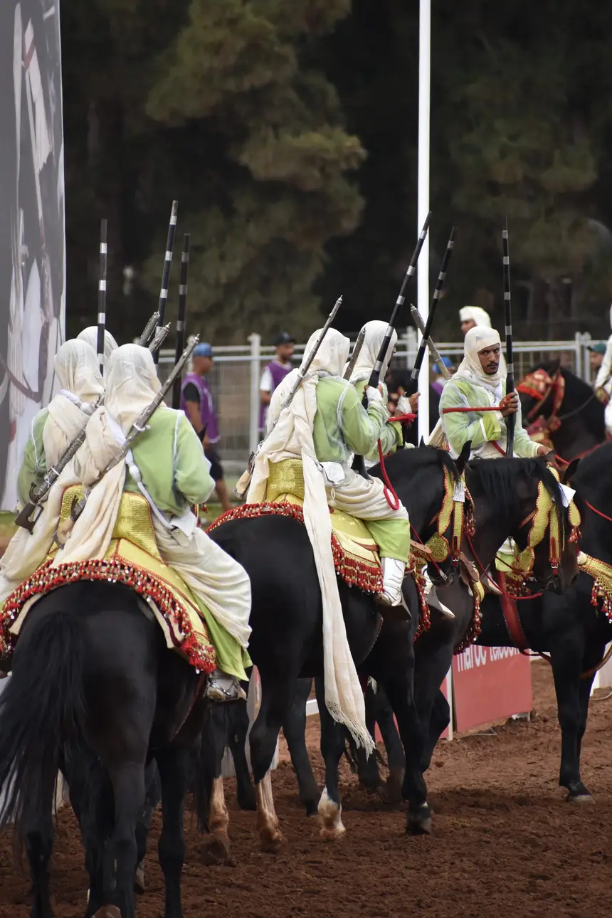 Tbourida fantasia print — Moroccan horsemen charging through gunpowder smoke (BWK-709), photograph by Saida