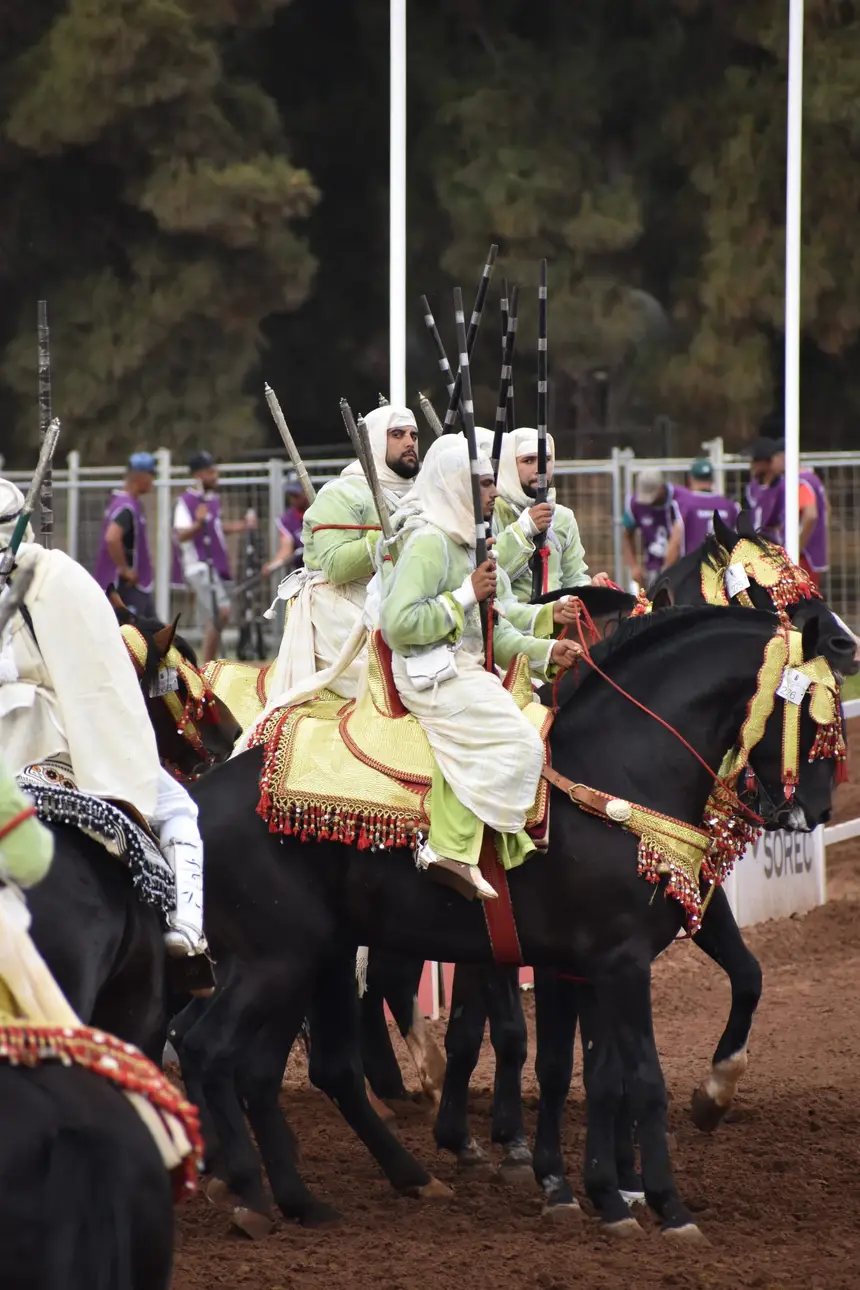 Tbourida fantasia print — Moroccan horsemen charging through gunpowder smoke (BWK-711), photograph by Saida
